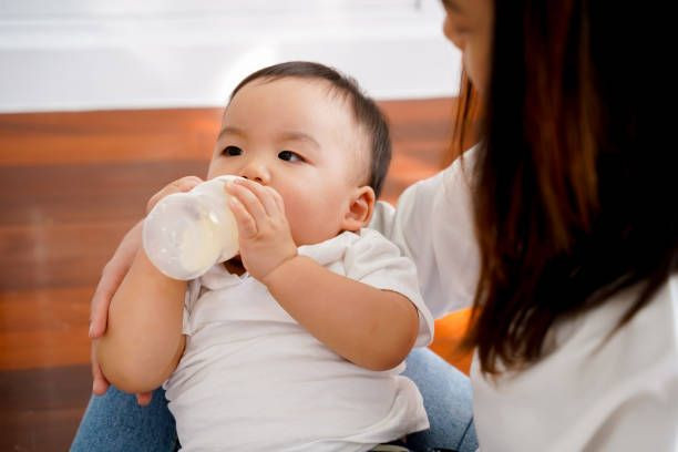 Menyusu dengan botol susu